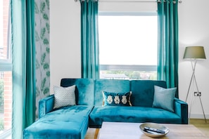 City Apartment | Living area | TV