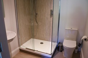 Bathtub, hair dryer, towels