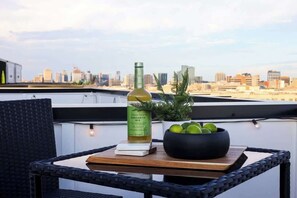 Outdoor dining - The Willow - Rooftop w/ Skyline Views + Sauna! (Nashville)