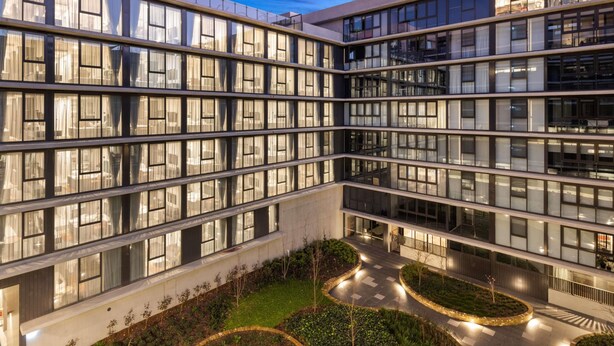 A modern multi-story building with large windows and a central courtyard. - The Sebel Canberra Campbell (Campbell)