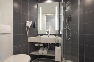 Shower, hydromassage showerhead, eco-friendly toiletries, hair dryer