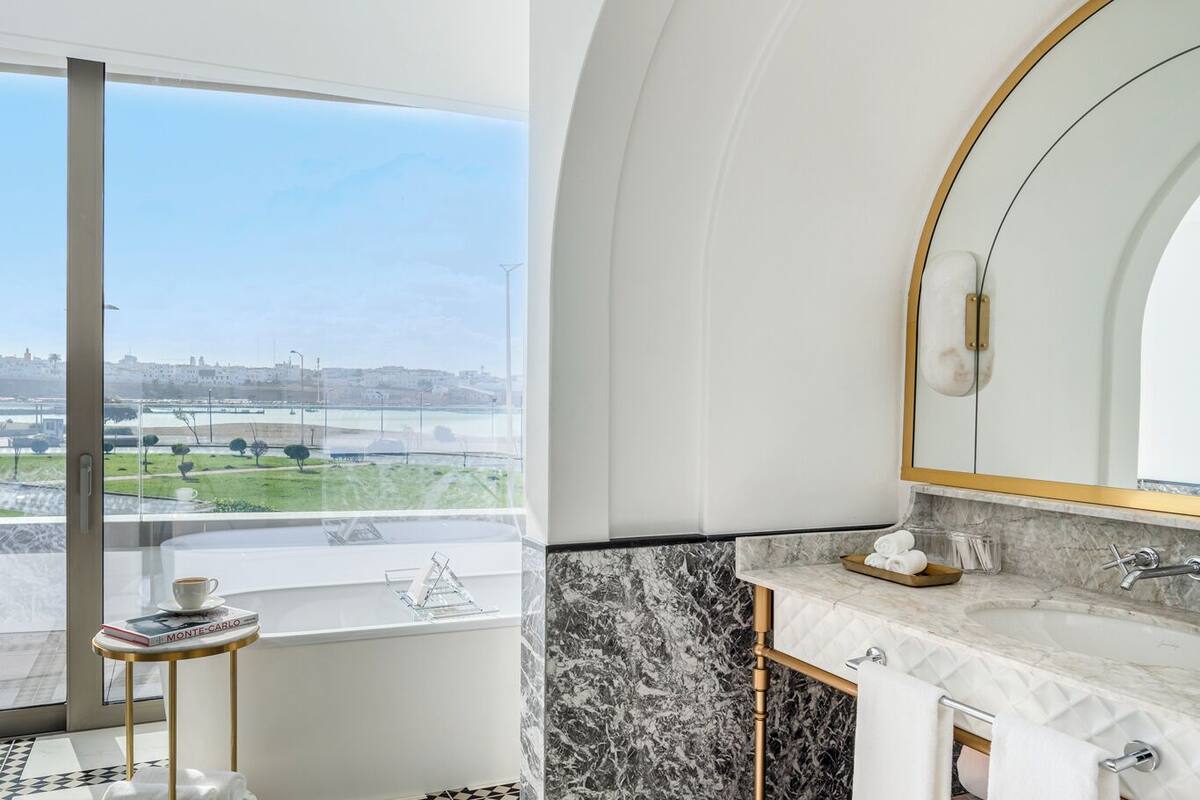 suite, 1 king bed | bathroom | separate bathtub and shower, eco-friendly toiletries, hair dryer