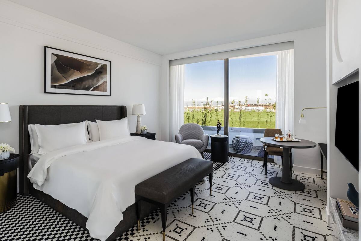 Premium bedding, pillow-top beds, minibar, in-room safe