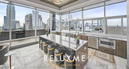 Reluxme | Uptown-High Rise w/ Stunning Views