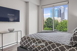 1 bedroom, desk, laptop workspace, iron/ironing board - Reluxme | Uptown-High Rise w/ Stunning Views (Charlotte)