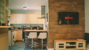 Standaard appartement, en-suite badkamer | Gemeenschappelijke keuken