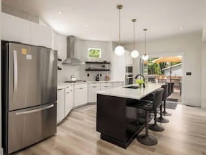 Fridge, microwave, oven, stovetop - Modern 4Bd Home | Outdoor Living, Near Downtown and Children's Hospital (Columbus)