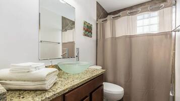 Hair dryer, towels, soap, shampoo