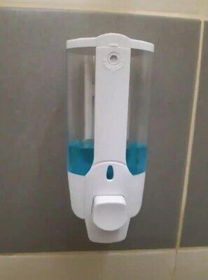 Shower, towels, soap, toilet paper