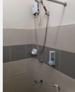 Shower, towels, soap, toilet paper