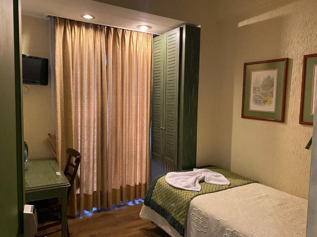 Desk, laptop workspace, free WiFi, bed sheets