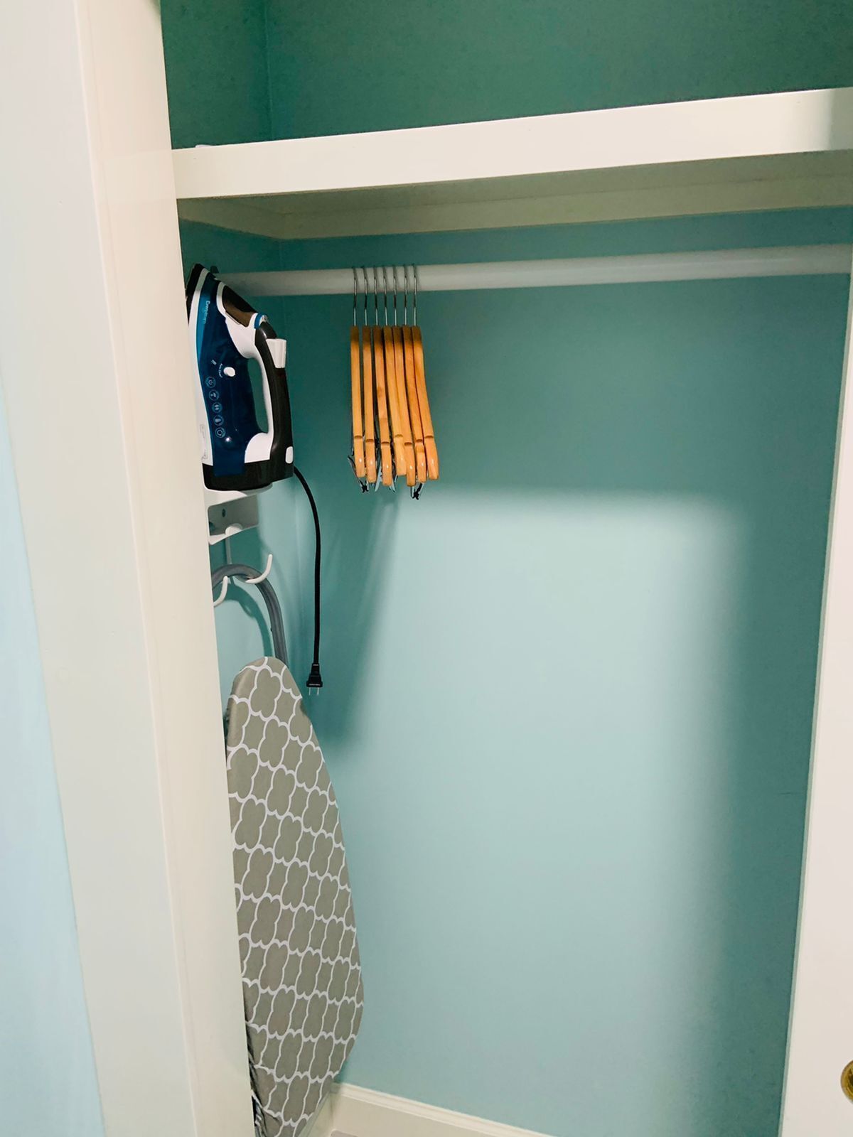 desk, laptop workspace, blackout curtains, iron/ironing board