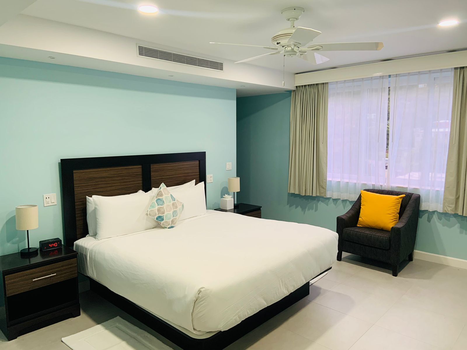 desk, laptop workspace, blackout curtains, iron/ironing board