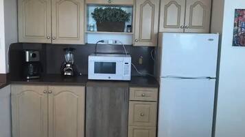 Fridge, microwave, coffee/tea maker, toaster