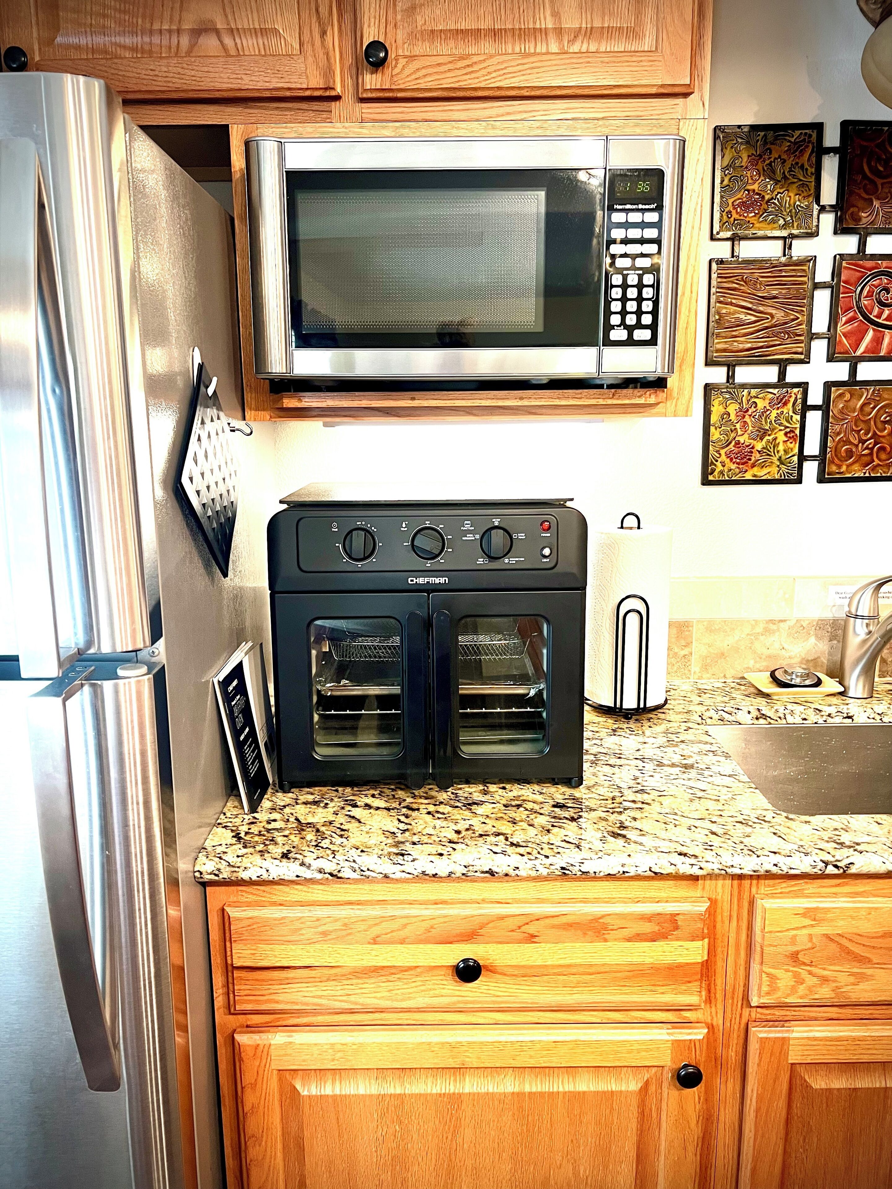 Microwave, Air fryer, full-size fridge/freezer w/ice maker, + more appliances.