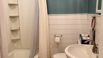 Combined shower/tub, hair dryer, towels, soap