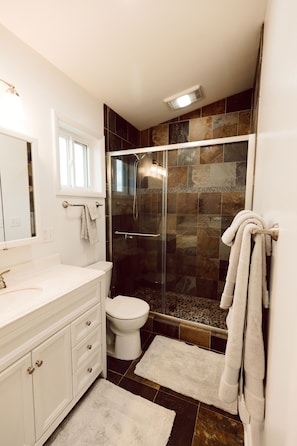 Shower, towels, toilet paper