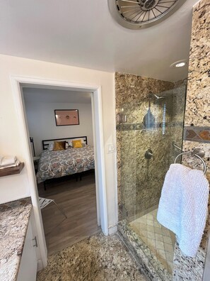 Bathtub, hair dryer, towels, soap
