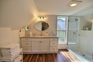 Combined shower/tub, hair dryer, towels, soap