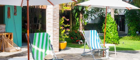 Outdoor pool, open 8:00 AM to 8:00 PM, sun loungers