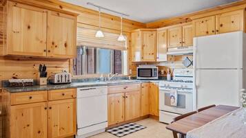 Fridge, microwave, oven, cookware/dishes/utensils