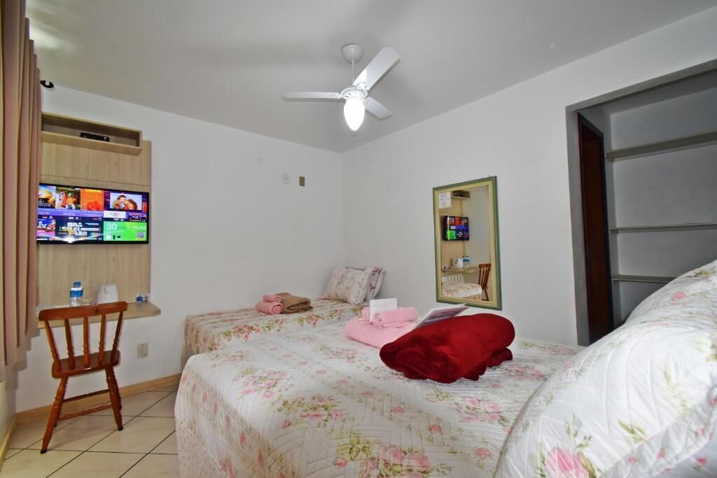 Triple Room (Suite Tripla) | Blackout drapes, iron/ironing board (on request), WiFi (free)