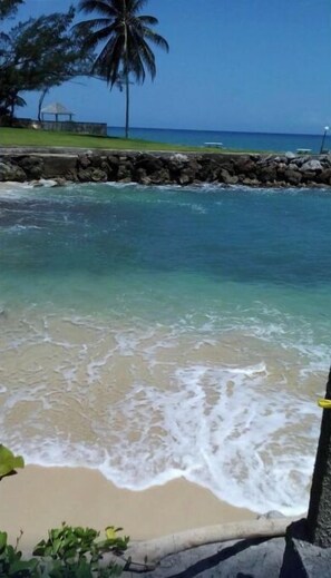 On the beach, sun-loungers, beach towels