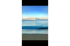 On the beach, sun-loungers, beach towels - Beach Apartment, Walk to the Beach! (Rincon)