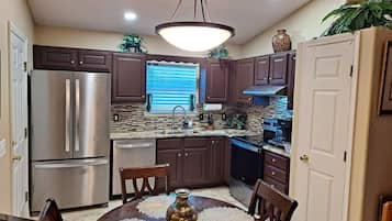 Cottage, 3 Bedrooms | Private kitchen | Full-size fridge, microwave, stovetop, dishwasher