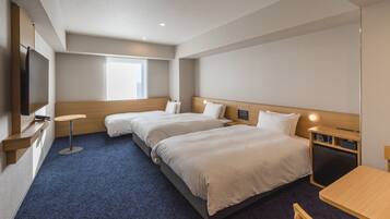 Down comforters, blackout drapes, free WiFi, bed sheets