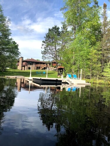 Log Cabin on 40 acres with a private lake