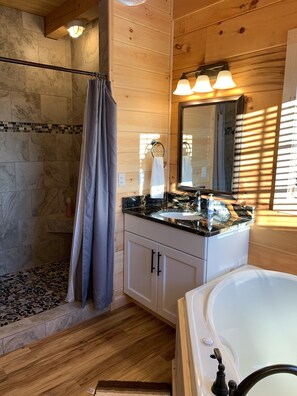 Shower, jetted tub, hair dryer, towels