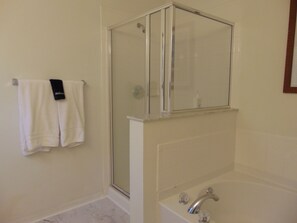 Combined shower/bathtub, hair dryer, towels, soap