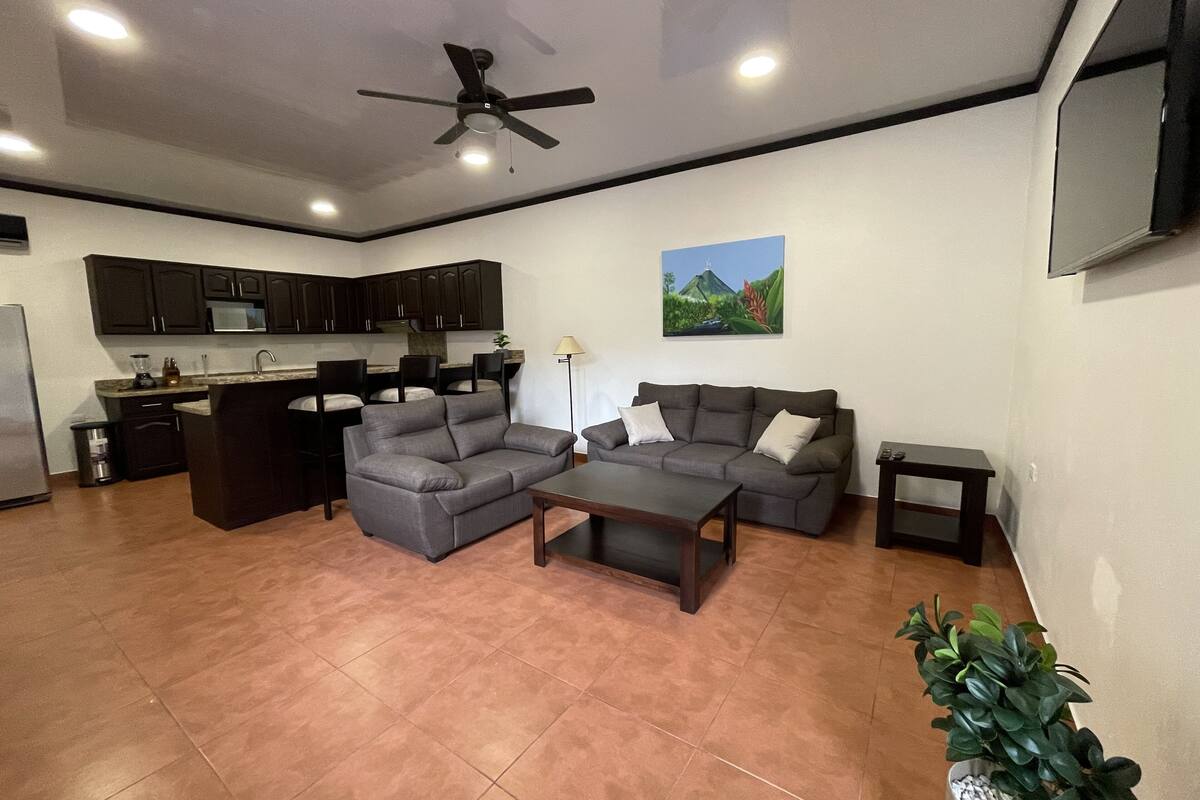 Superior Condo | Living area | 50-inch LCD TV with cable channels, TV