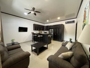 Grand Condo | Living area | 50-inch LCD TV with cable channels, TV