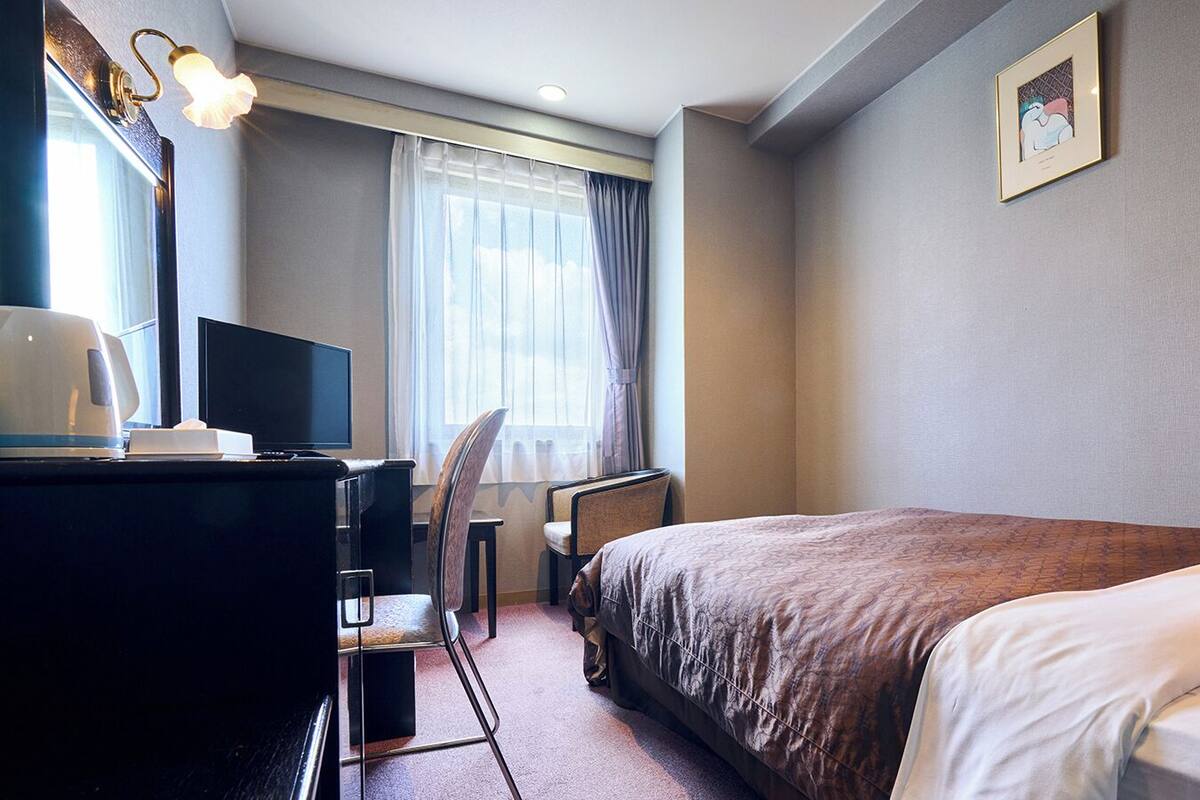 Iron/ironing board (on request), WiFi (free), bed sheets
