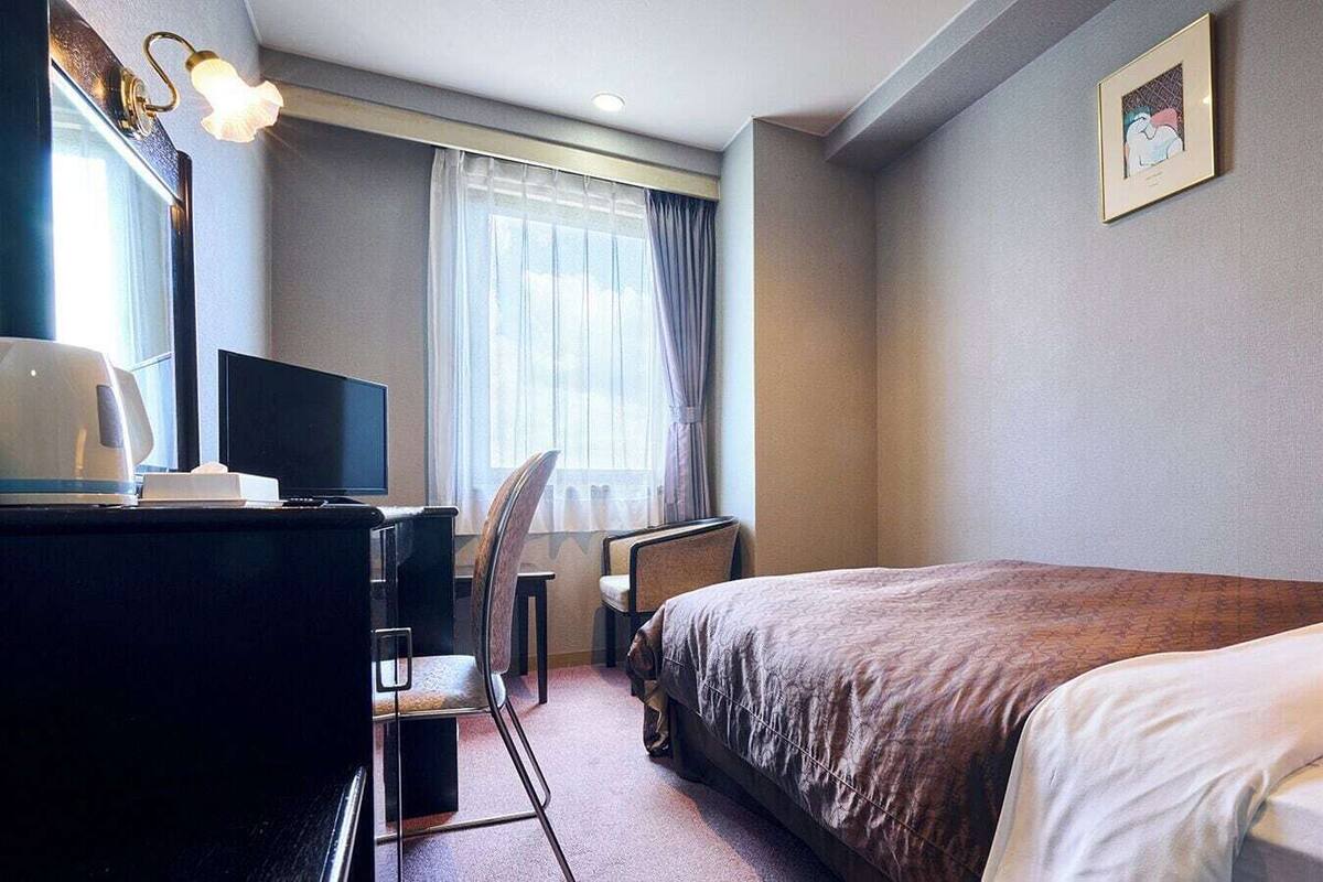 Iron/ironing board (on request), WiFi (free), bed sheets