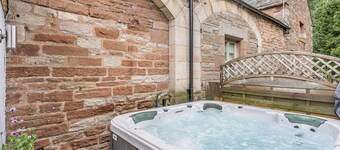 Traditional and stylish converted two storey historic coach house.