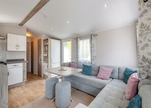 Living area - 12ft-wide caravan ideal for small families with one double and one twin. (Monkton, Nr Ramsgate)