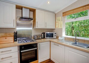 Refrigerador, horno, parrilla de estufa y tostadora 