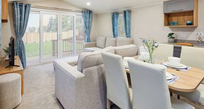 12ft-wide stylish and comfortable caravan with one double and one twin.