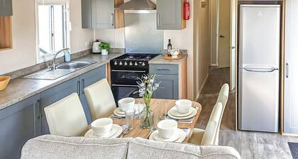 12ft-wide stylish and comfortable caravan with one double and one twin.