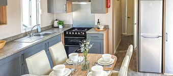 12ft-wide stylish and comfortable caravan with one double and one twin.