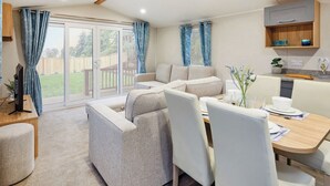 Unclassified image, 5 of 5, button - 12ft-wide stylish and comfortable caravan with one double and one twin. (Chapel St Leonards)