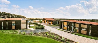 Four bed lodge with three king-size beds and one twin (king by arrangement).