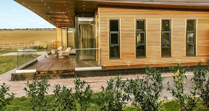 Four bed lodge with three king-size beds and one twin (king by arrangement).