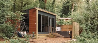 Contemporary mini pod with one double pull-out bed and en suite shower and W.