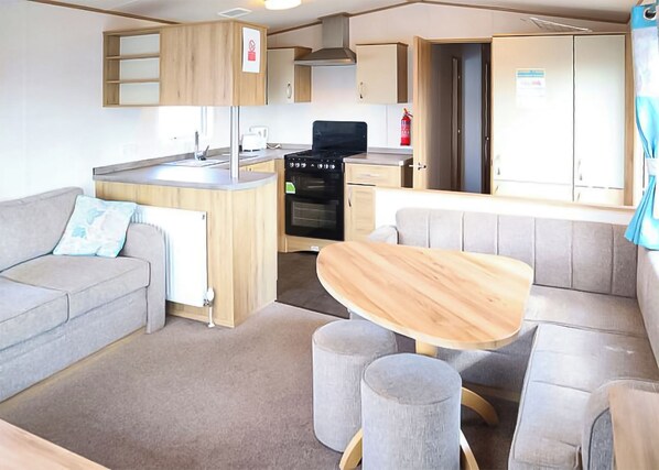 Interior - 12ft-wide stylish and comfortable caravan with one double and two twin. (Chapel St Leonards)