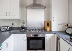 Geladeira, fogão, cooktop, torradeira