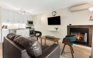 TV, fireplace, offices - Beautifully Remodeled Top-Floor Condo Downtown! (Bend)